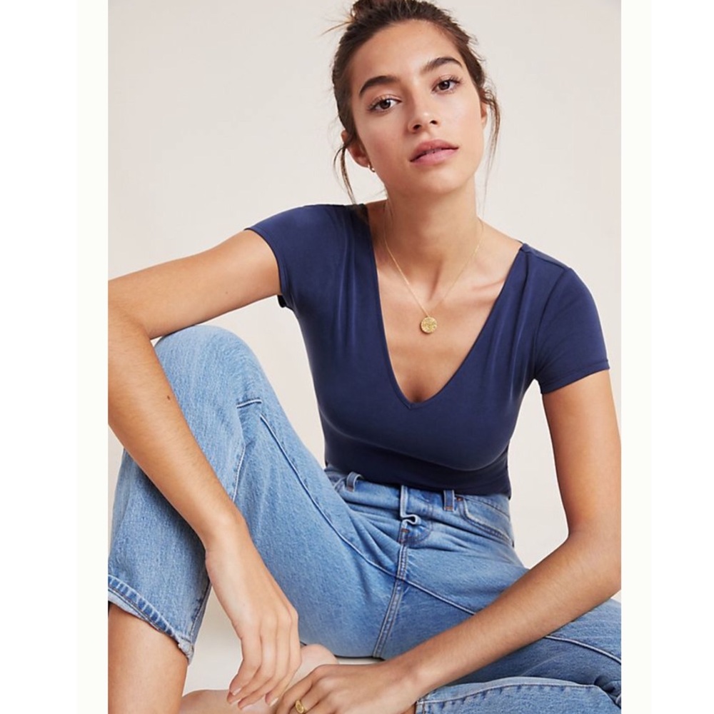 Sold Anthropologie by “Little Black Body Suit”